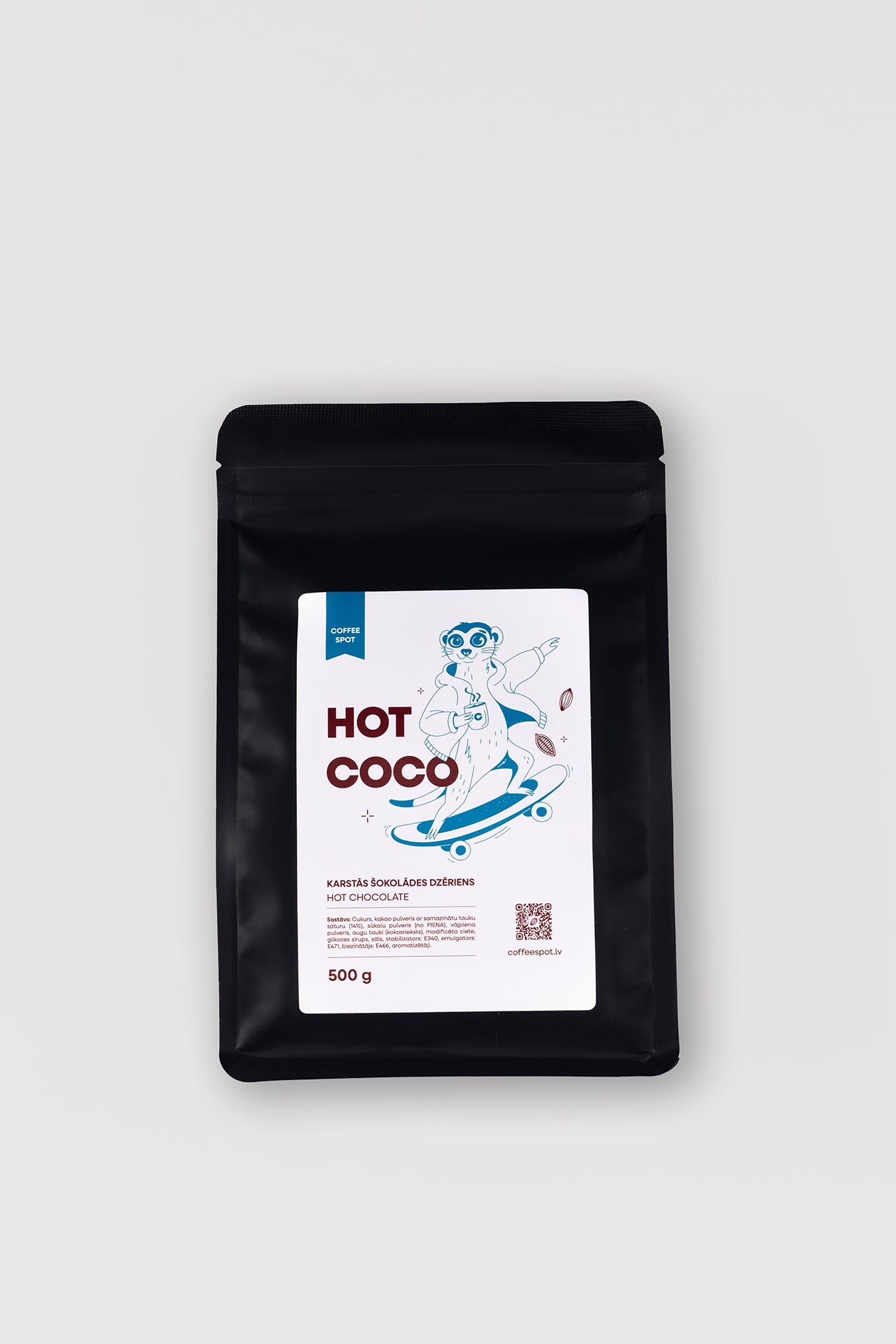 A 500g black stand-up pouch of Hot Coco coffee beans with a white label featuring a cartoon character and blue text, set against a light gray background.
